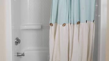 Combined shower/tub, hair dryer, towels, shampoo
