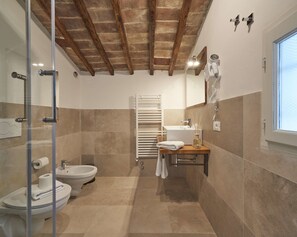 Apartment, Multiple Beds, City View (Giotto) | Bathroom | Shower, hair dryer, bidet, towels - Panoramic Suites Cavour 34 (Florence)