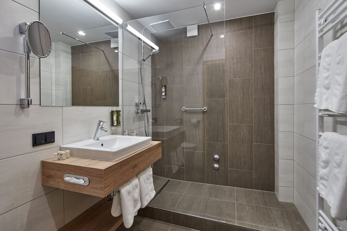 suite | bathroom | shower, rainfall showerhead, free toiletries, hair dryer