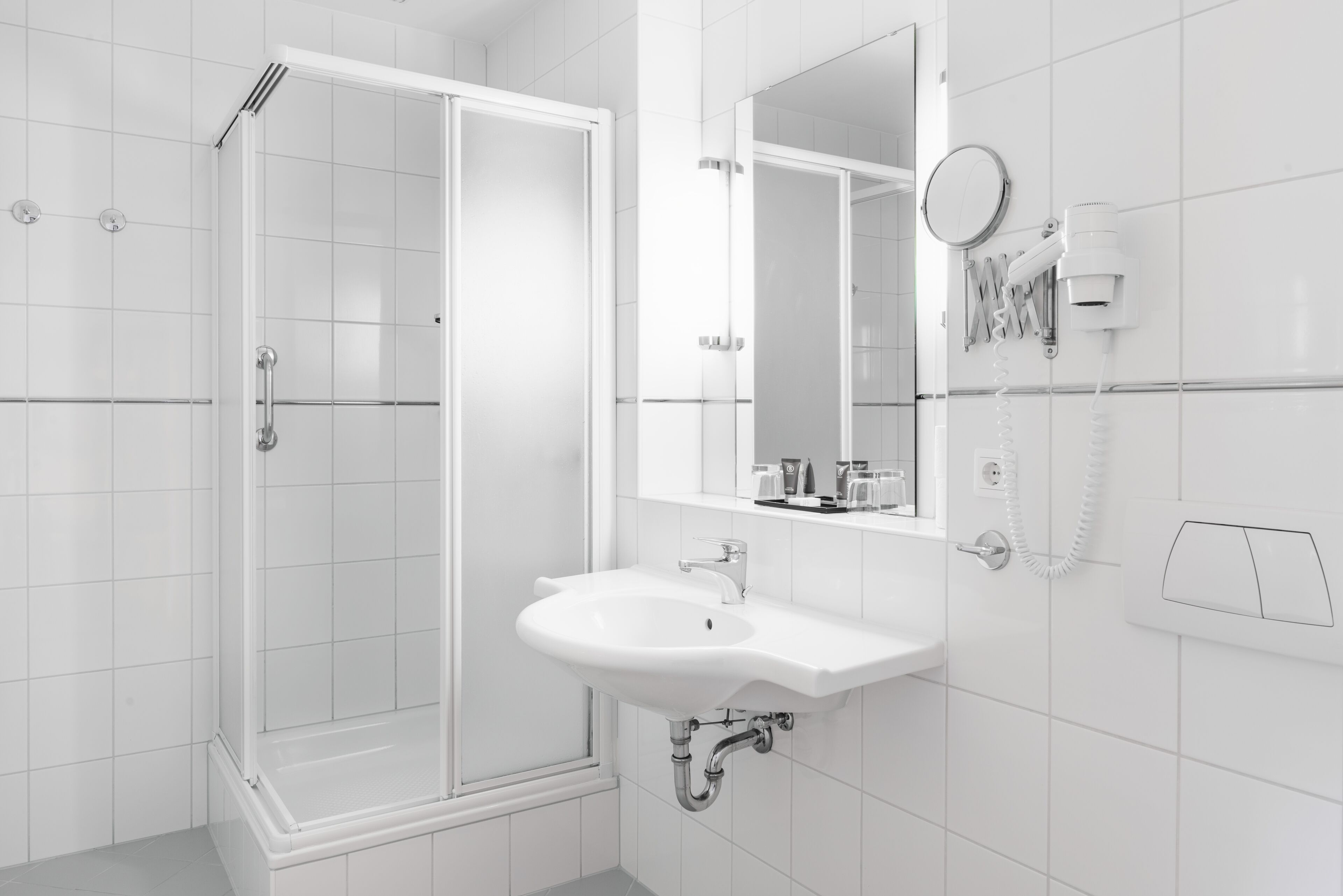 shower, eco-friendly toiletries, hair dryer, towels