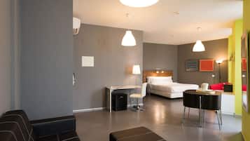 Superior Double or Twin Room | Living area | Flat-screen TV