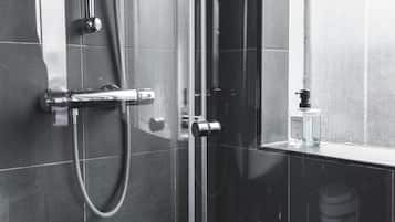 Shower, free toiletries, hair dryer, towels