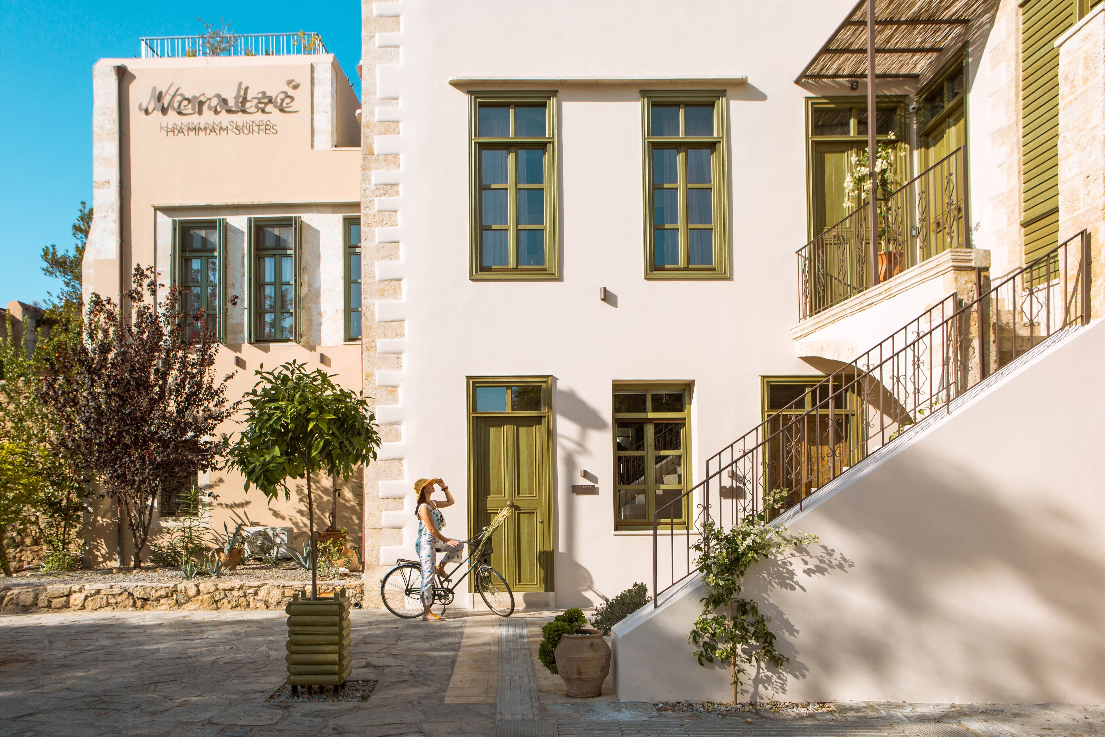 A building with a sign reading "Wermutze Hammam Sulfese".
