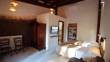 Camera con letto matrimoniale o 2 letti singoli, vista giardino, al piano terra | Minibar, con arredamento individuale, tende oscuranti, Wi-Fi gratuito