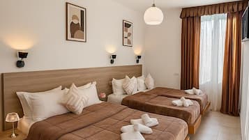 Economy vierpersoonskamer | Een kluis op de kamer, een strijkplank/strijkijzer, gratis wifi