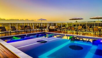 Outdoor pool, pool umbrellas, pool loungers