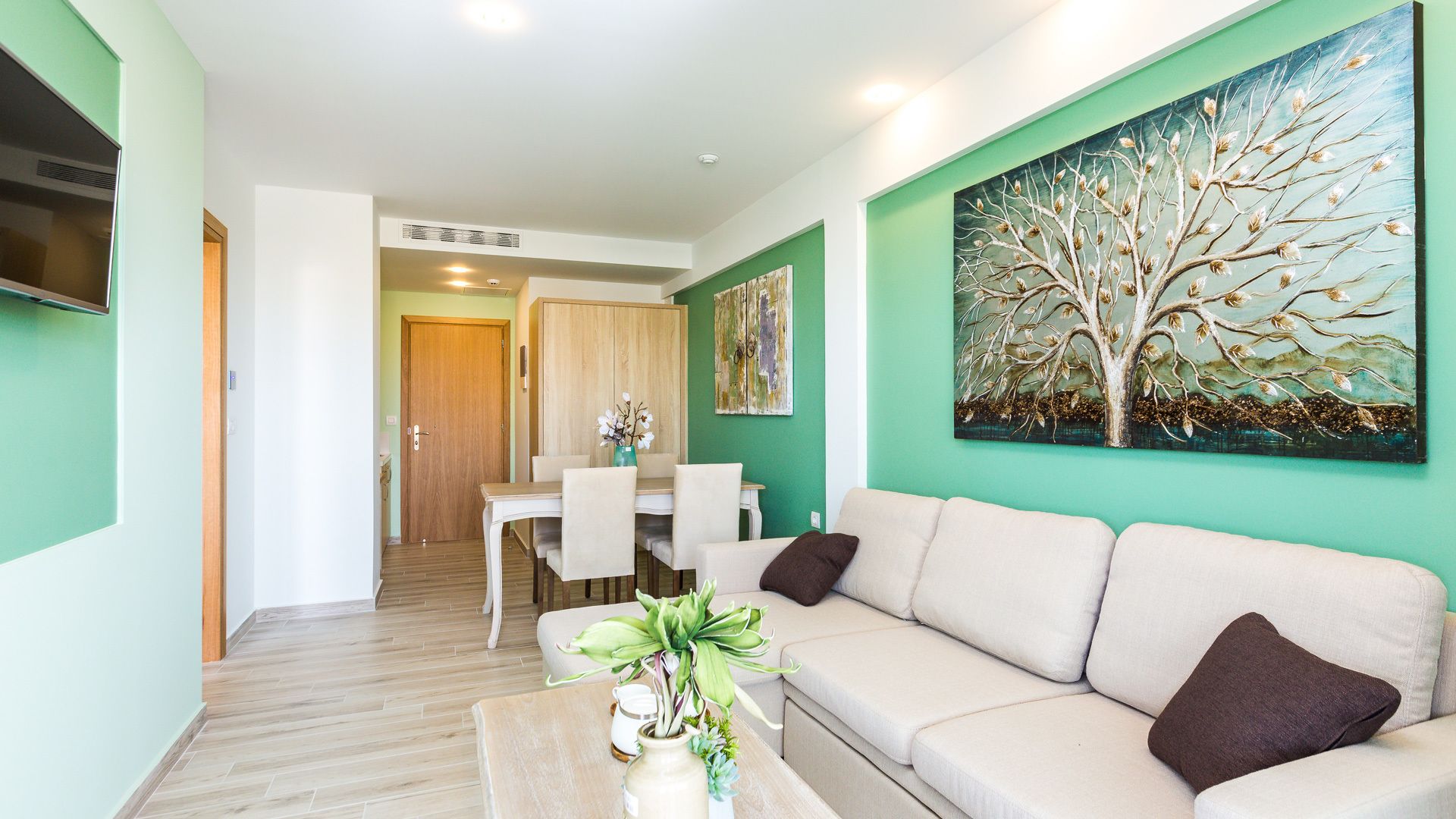 Junior Suite, Balcony | Living area | 26-inch flat-screen TV with cable channels, TV, books