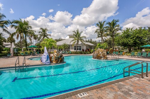 Lakefront home with water view, golf, pool, hot tub, & tennis