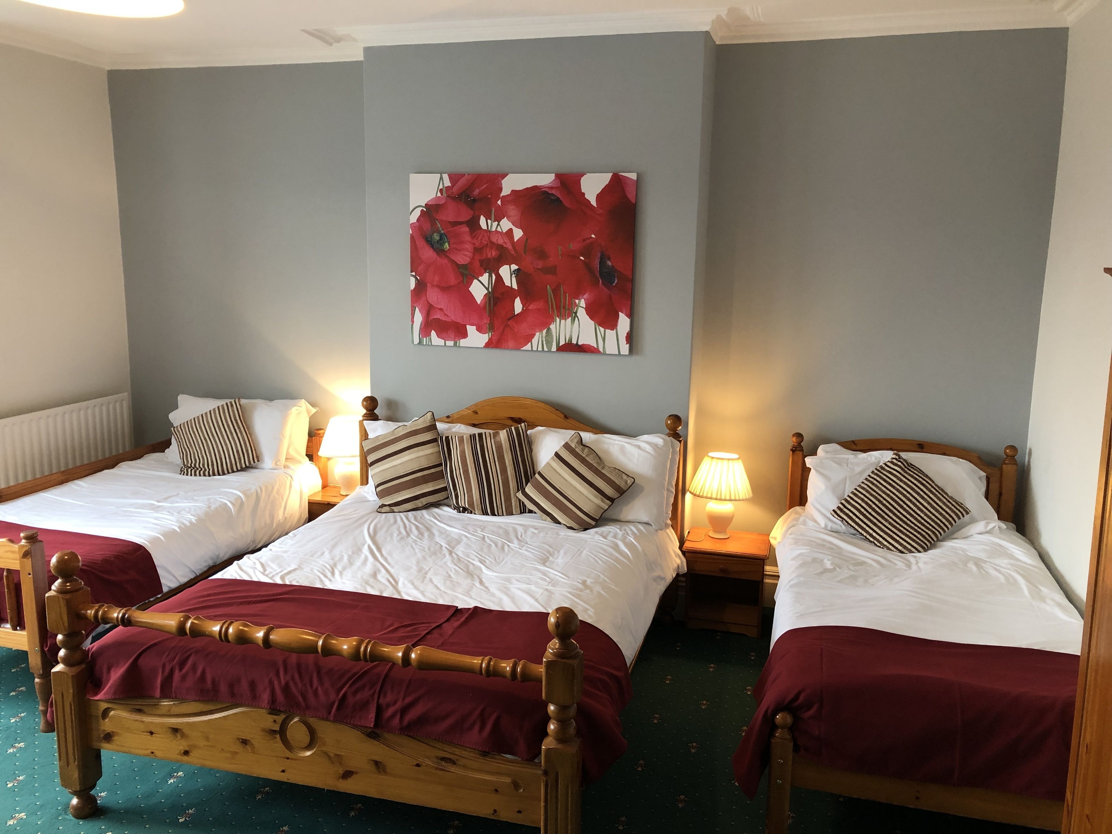 family quadruple room, multiple beds, non smoking | 1 bedroom, desk, iron/ironing board, free wifi