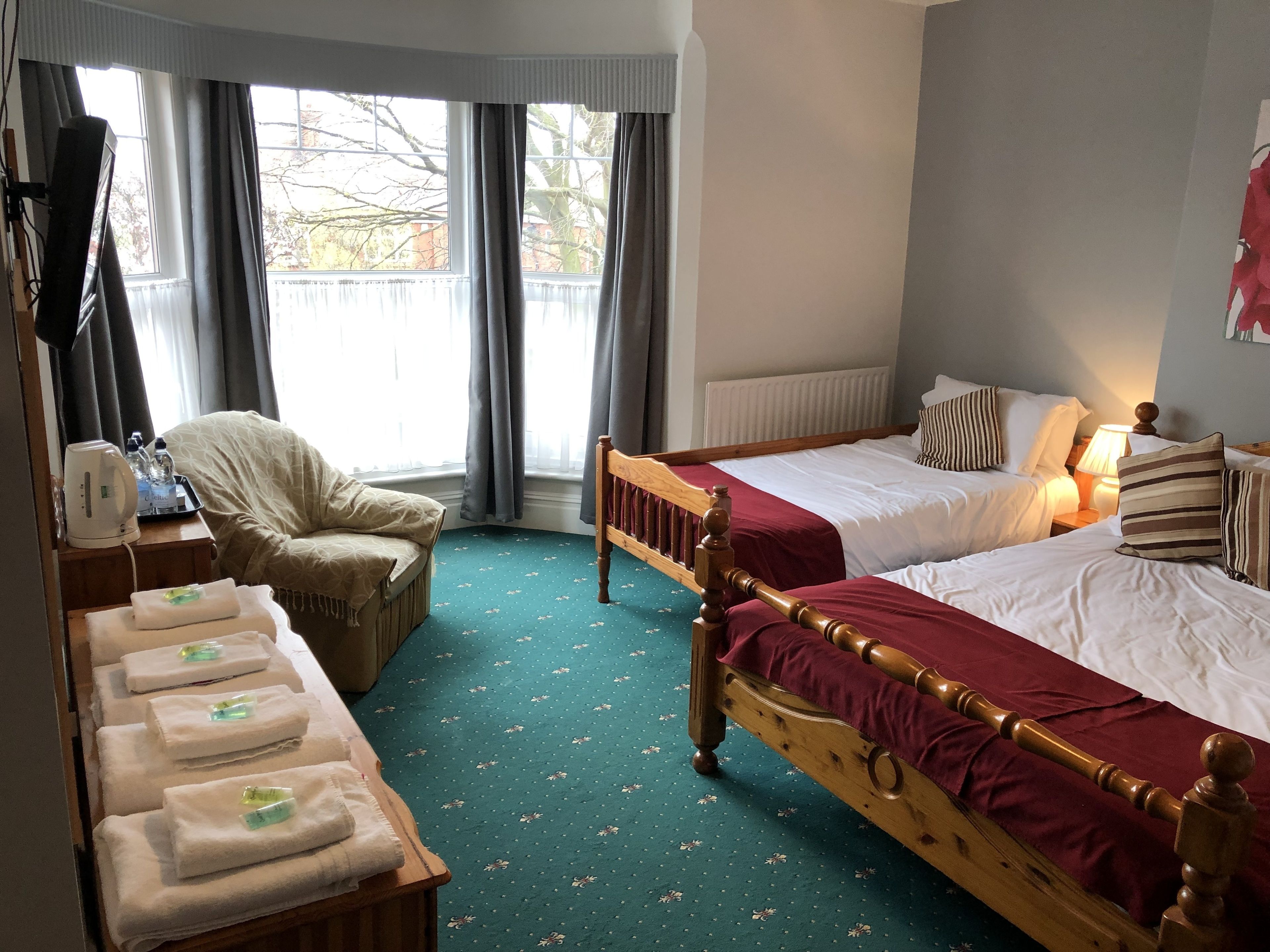 family quadruple room, multiple beds, non smoking | 1 bedroom, desk, iron/ironing board, free wifi