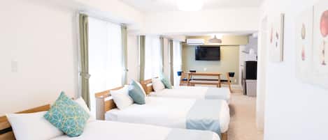 Family Room, Multiple Beds | Down comforters, desk, laptop workspace, blackout drapes