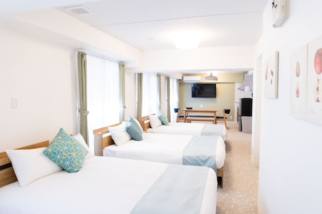 Family Room, Multiple Beds | Down comforters, desk, laptop workspace, blackout drapes
