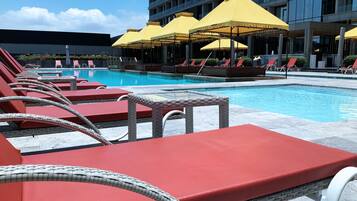 Indoor pool, outdoor pool, pool umbrellas, pool loungers