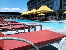 Indoor pool, outdoor pool, pool umbrellas, sun loungers