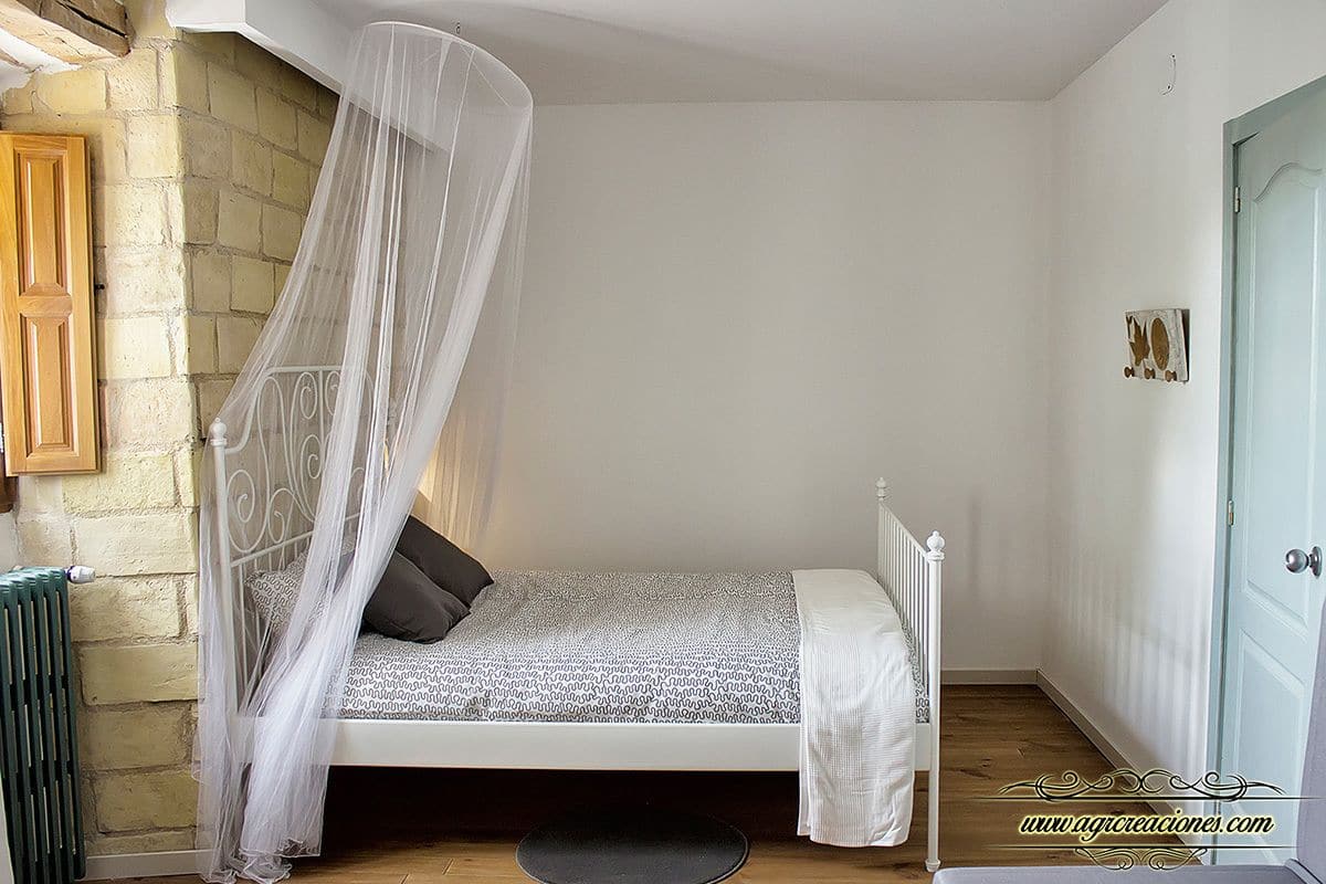Desk, blackout curtains, soundproofing, free cots/infant beds
