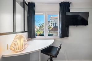 Economy Double Room | 1 bedroom, premium bedding, in-room safe, blackout curtains