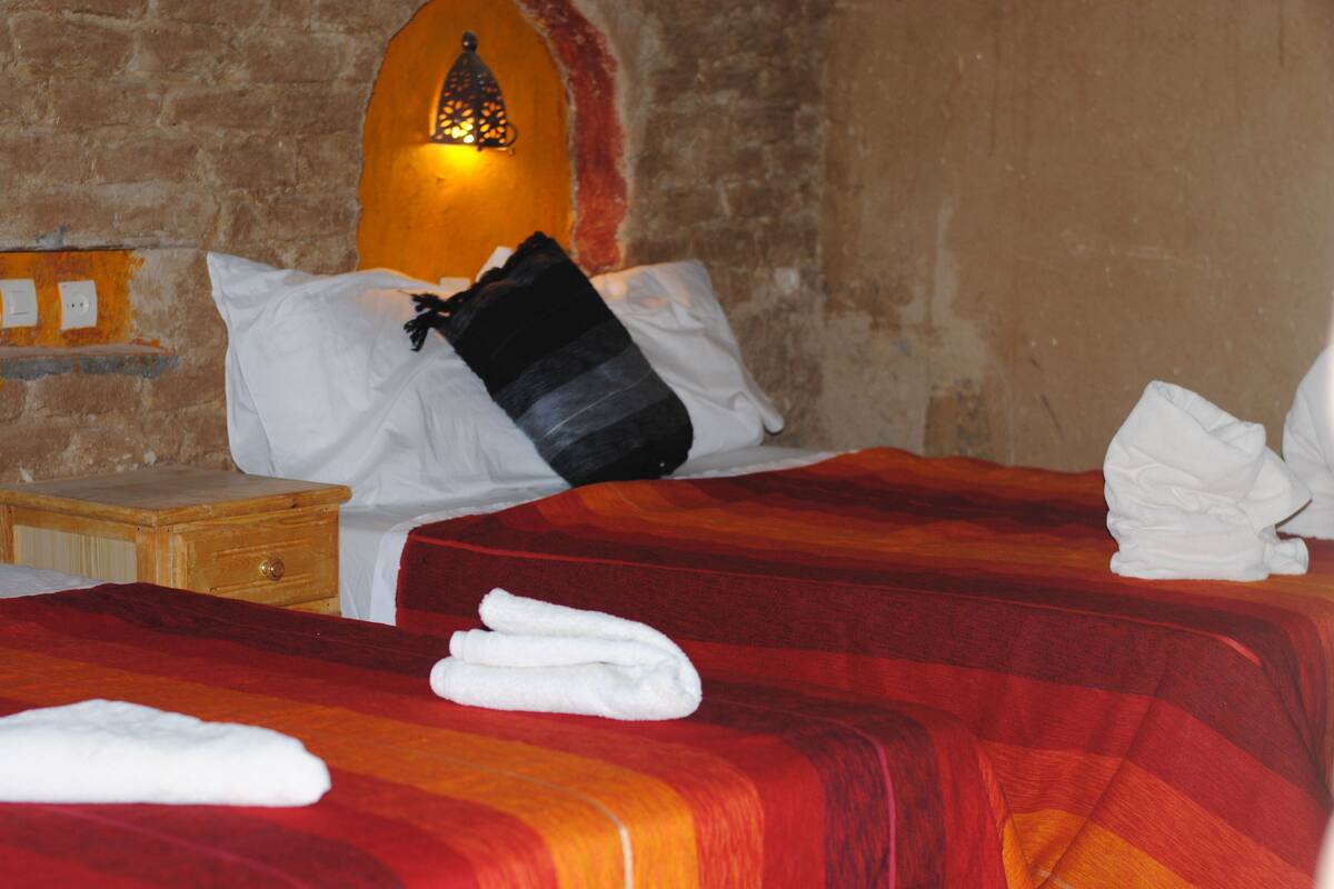 Chambre Quadruple Confort | Rideaux occultants, chambres insonorisées, Wi-Fi, draps fournis