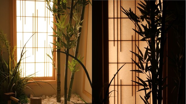 A traditional Japanese room with a tatami mat floor, a shoji screen, and a bamboo plant. - The Residence Shin (Kyoto)