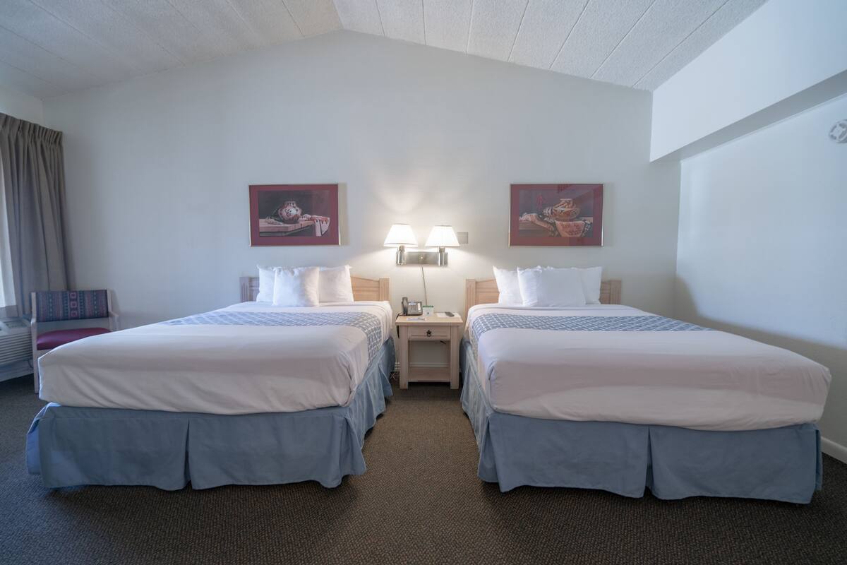 standard double room, 2 queen beds, non smoking | blackout curtains, free wifi, bed sheets