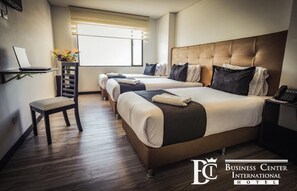 Standard Triple Room | Desk, blackout drapes, free WiFi, bed sheets - Hotel Business Center International (Bogotá)
