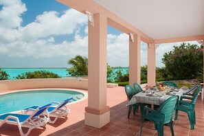 Outdoor dining - 2 acre Waterfront Estate (unbelievable views, 2 Pools, Kayaks,) (Providenciales)