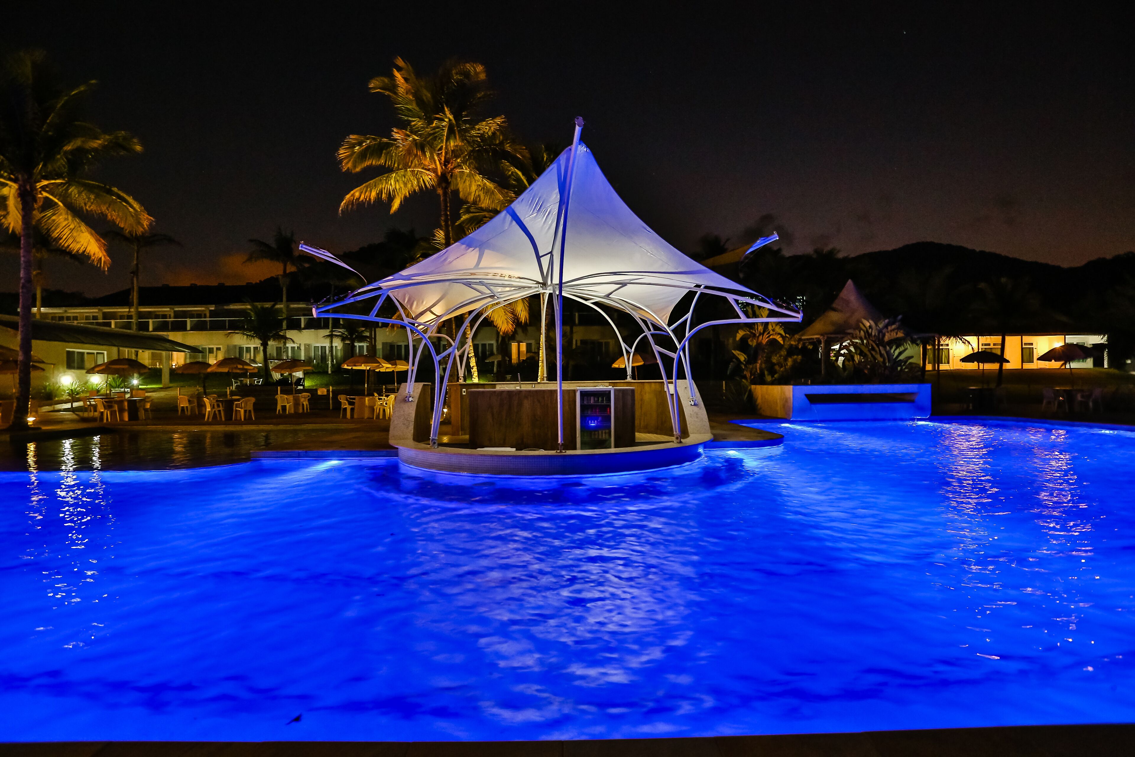 2 indoor pools, outdoor pool, open 8:00 am to 8:00 pm, pool umbrellas