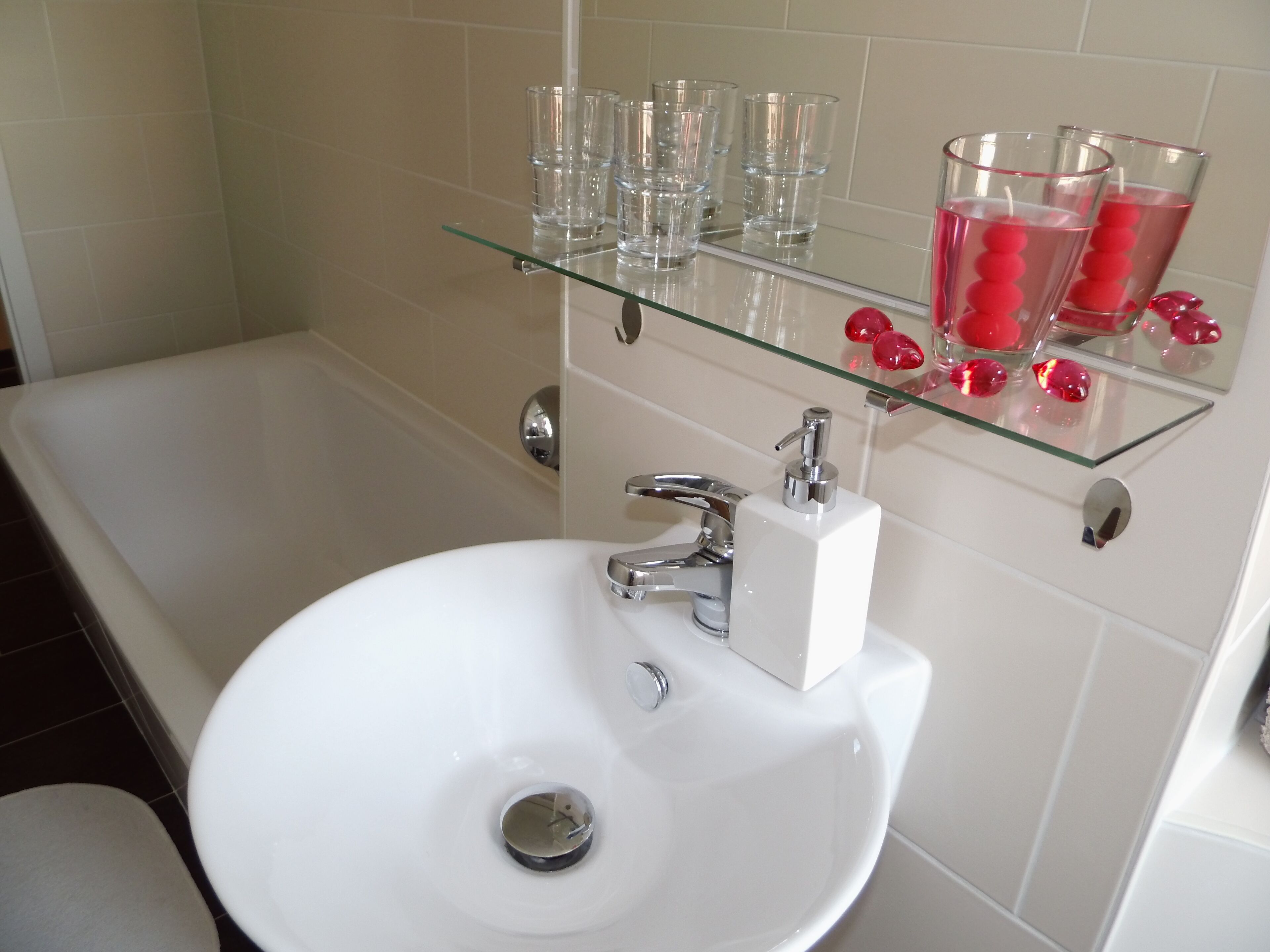 Combined shower/tub, hair dryer, towels, soap