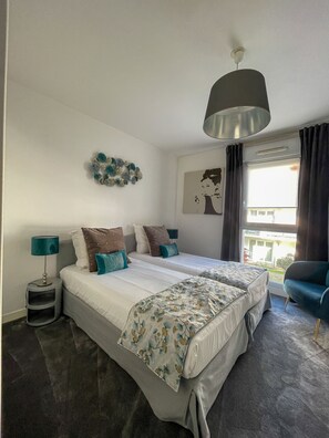 2 slaapkamers, een strijkplank/strijkijzer, gratis wifi, beddengoed