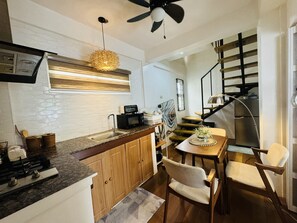 Fridge, microwave, stovetop, coffee/tea maker