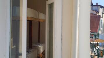 Shared Dormitory, Women only, Pool View (Air conditioning) | Iron/ironing board, free WiFi, bed sheets