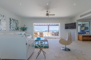 Condo | Living room | TV - Isla 33 - 4 Bedroom PH #1304 (Isla Mujeres)