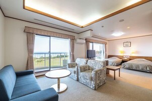 舒适套房 | 办公桌、免费 WiFi、床单