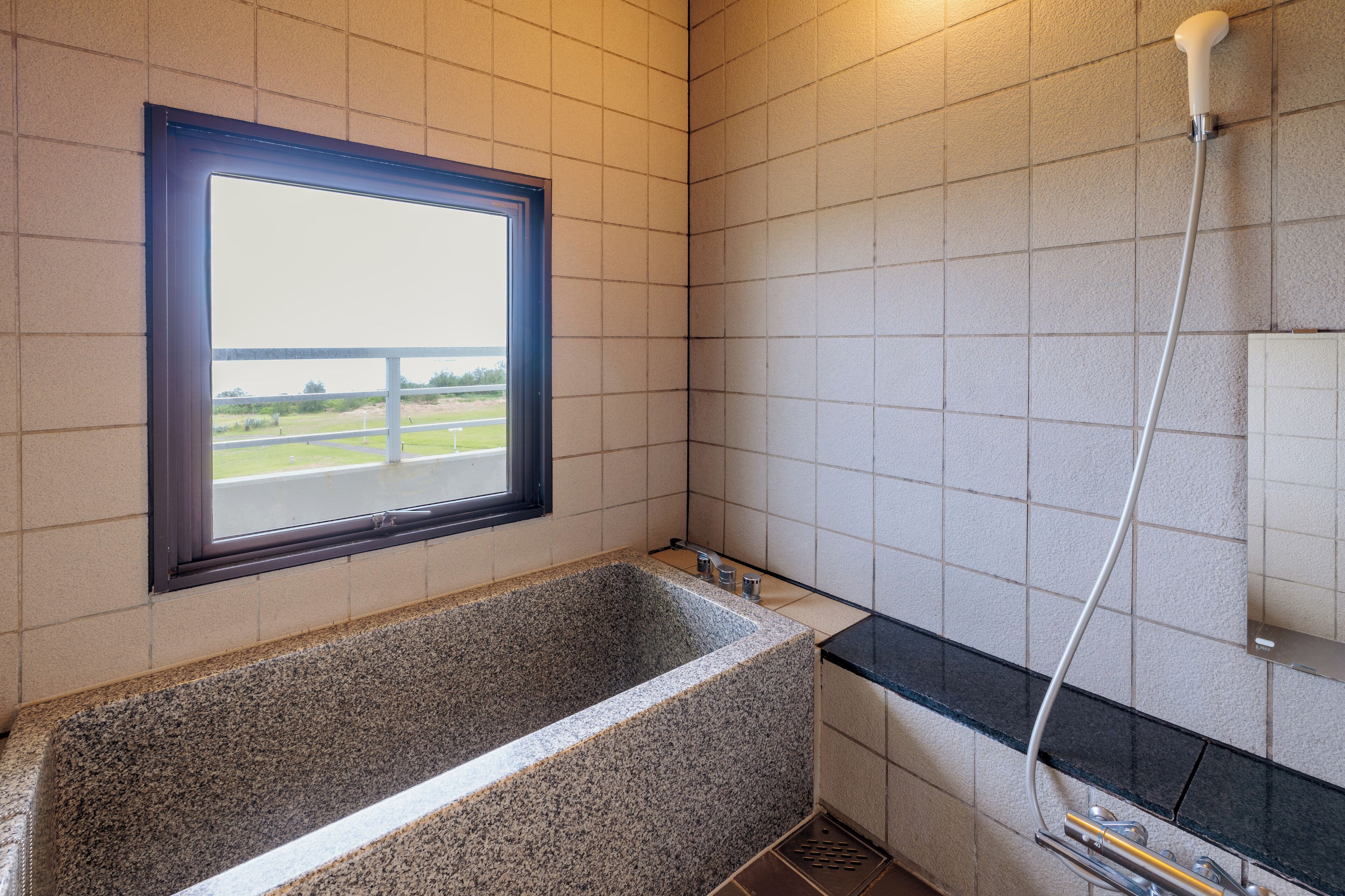 comfort suite | bathroom | free toiletries, hair dryer, slippers, electronic bidet