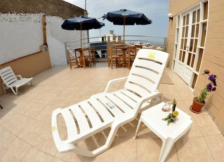 Sun deck. Hospedaje El Álamo Playa Pulpos