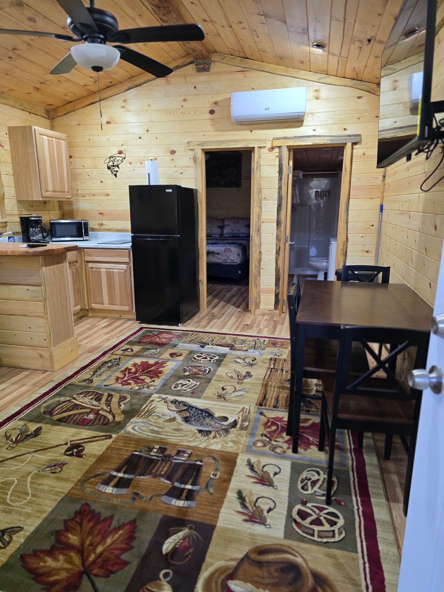 Cabin | Living area | 32-inch flat-screen TV with satellite channels