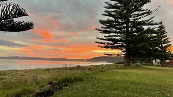 On the beach, sun loungers