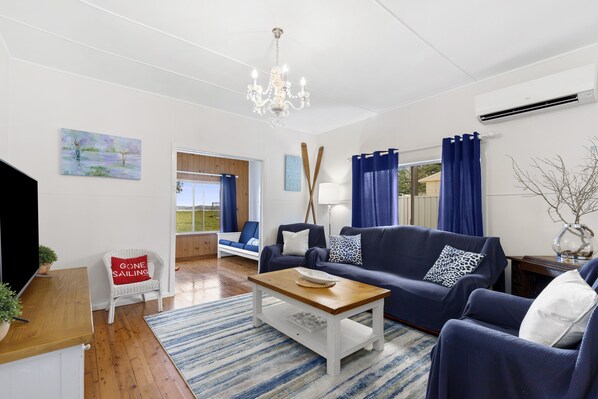 Smart TV, fireplace, DVD player, books