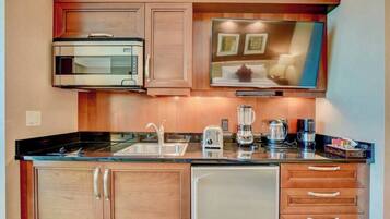 Fridge, microwave, stovetop, coffee/tea maker