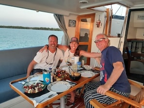 Outdoor dining - Affordable luxury yacht charters. (Key Largo)