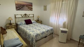 4 dormitorios, tabla de planchar con plancha, Internet y ropa de cama
