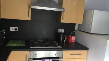 Fridge, microwave, toaster, cookware/dishes/utensils