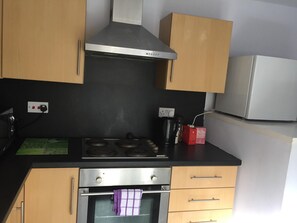 Fridge, microwave, toaster, cookware/dishes/utensils