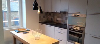 Appartement avec patio, au calme, près du marché et en plein centre ville