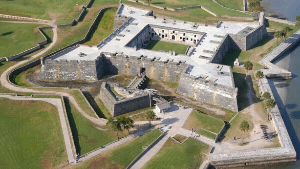 An aerial view of a historical fort with a central courtyard, surrounded by walls and a moat. - Live the Beach Life! Stay in our FUN & AMAZING Townhome! (St Augustine)