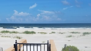 A beach view with a wooden fence and a clear sky. - Live the Beach Life! Stay in our FUN & AMAZING Townhome! (St Augustine)