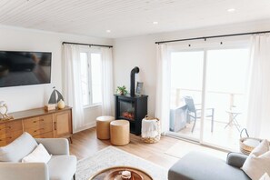 TV, fireplace, offices - Lakefront Retreat with Kayaks, Fire Pit & Dock (Geneva)