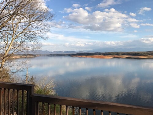 Amazing Lake and Smoky Mountain Views from this Charming Lake House.