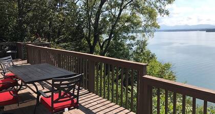 Amazing Lake and Smoky Mountain Views from this Charming Lake House.