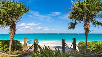 On the beach, sun-loungers, beach towels