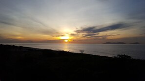 On the beach, sun-loungers, beach towels